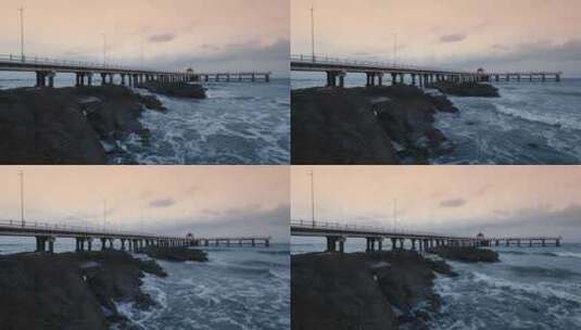 日落时分博鳌红石滩灯塔海滨风光高清在线视频素材下载