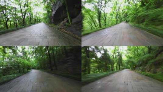 汽车行驶在森林公园盘山路上高清在线视频素材下载