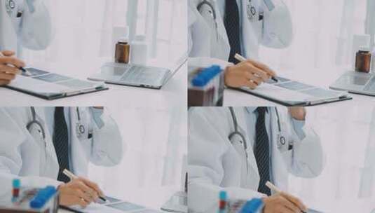 医生在办公室使用笔记本和手机工作高清在线视频素材下载