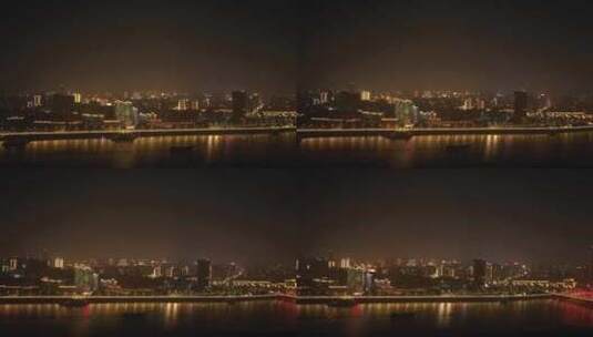 南昌市赣江夜景航拍城市夜晚建筑江边风光高清在线视频素材下载