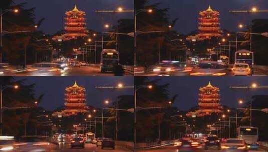 武汉长江大桥夜晚车流中的地标古建筑黄鹤楼高清在线视频素材下载