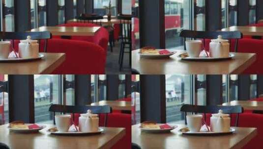 空咖啡馆桌子上的甜点和茶具高清在线视频素材下载