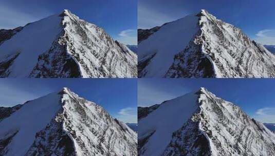 航拍四川岷山山脉雪宝顶雪山山脊上的登山队高清在线视频素材下载