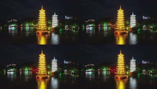 广西桂林两江四湖日月双塔城市夜景航拍风光高清在线视频素材下载