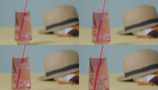 沙滩上的水杯和帽子高清在线视频素材下载