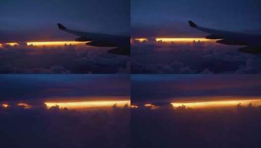 飞机机翼舷窗云层高空云海夕阳飞行高清在线视频素材下载