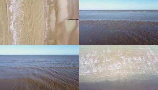 海浪拍打沙滩海滩浪花海面航拍高清在线视频素材下载