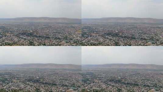 吉尔吉斯斯坦贾拉拉巴德市鸟瞰图高清在线视频素材下载