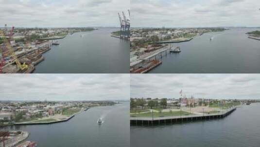 无人机拍摄了伊丽莎白新泽西海港和海港公园，展示了飘扬的美国国旗高清在线视频素材下载