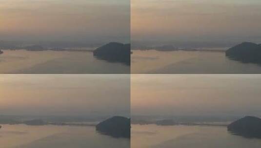航拍武汉东湖绿道傍晚黄昏湖面高清在线视频素材下载