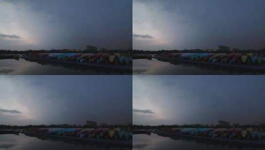 成都锦城湖湖边皮划艇黄昏晚霞闪电高清在线视频素材下载