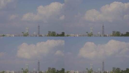 远望城市高层建筑蓝天白云高清在线视频素材下载