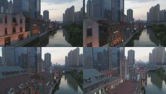 武汉市汉街航拍黄昏街景人工河道步行街桥高清在线视频素材下载