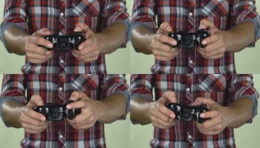 男子操作游戏控制器高清在线视频素材下载