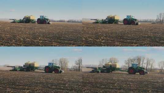 拖拉机带着播种机在田里播种小麦高清在线视频素材下载