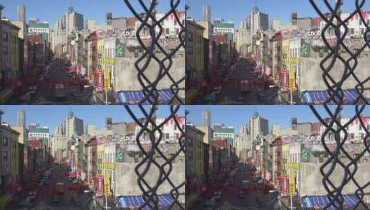 通过链条栅栏拍摄纽约唐人街区高清在线视频素材下载