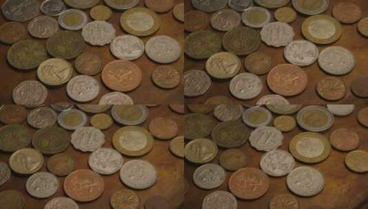 桌上的国际硬币高清在线视频素材下载