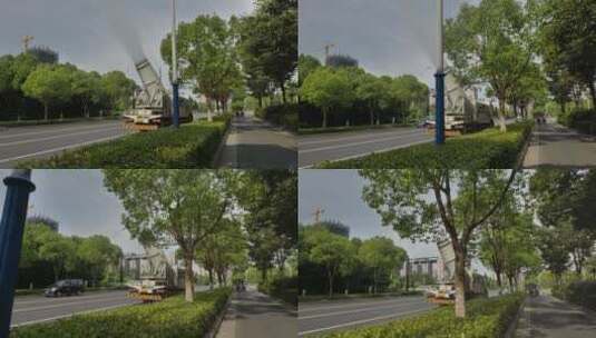 实拍杭州城市夏日高温下喷雾洒水车高清在线视频素材下载