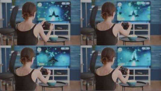 女游戏玩家在室内玩游戏高清在线视频素材下载