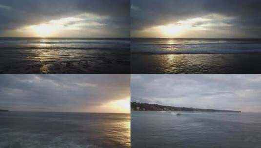 航拍夕阳下的海浪高清在线视频素材下载