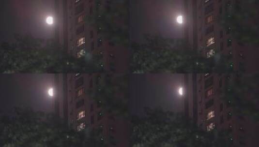 夜晚月亮-城市上空月亮升起-中秋月亮高清在线视频素材下载