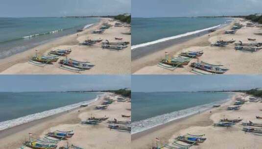 印尼巴厘岛金巴兰海滩渔村渔船航拍风光高清在线视频素材下载