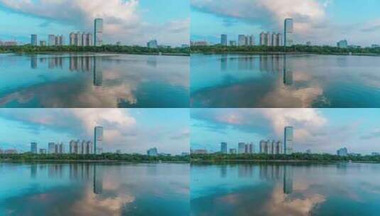 广西南宁南湖公园城市摩天大楼与蓝天白云高清在线视频素材下载