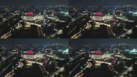 印尼雅加达伊斯蒂克拉尔清真寺城市夜景航拍高清在线视频素材下载