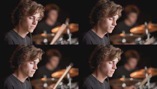 专注音乐的年轻鼓手演奏出动人节奏高清在线视频素材下载