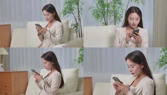 美女沙发上专注看手机高清在线视频素材下载