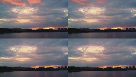 湖边学校小区天空晚霞延时云朵变化夕阳黄昏高清在线视频素材下载