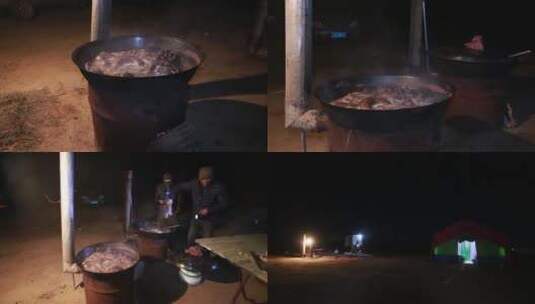 野外大锅晚上炖肉画面高清在线视频素材下载