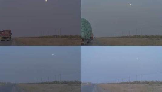 新疆且末沙漠公路货车月亮月落延时摄影高清在线视频素材下载