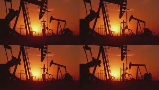 日出时的油井抽油机磕头机采油开采剪影夕阳高清在线视频素材下载