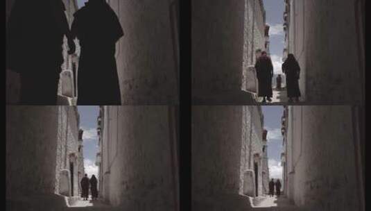 西藏寺院走廊的僧侣高清在线视频素材下载