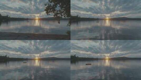 湖泊中日落的倒影高清在线视频素材下载