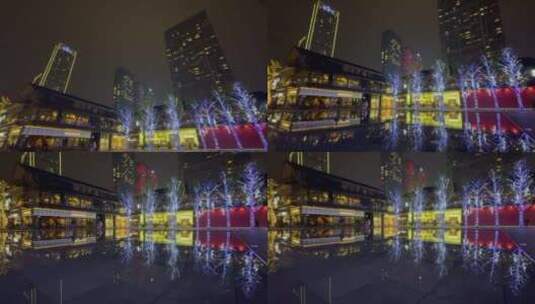 城市高楼夜景摇广场商业街喷泉倒影游客高清在线视频素材下载