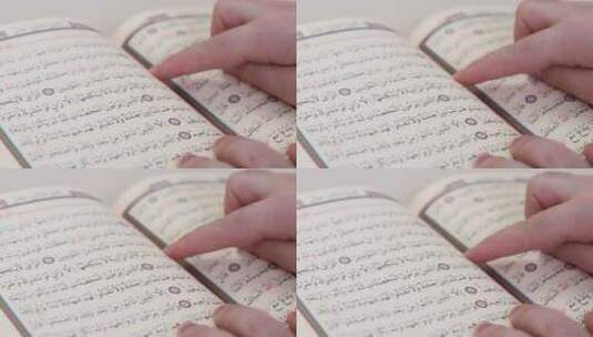 用手指读古兰经高清在线视频素材下载