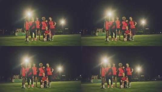 夜晚足球运动员集体拍照高清在线视频素材下载