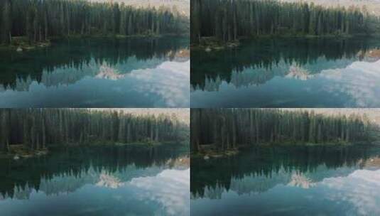 湖泊中的雪山树林倒影高清在线视频素材下载