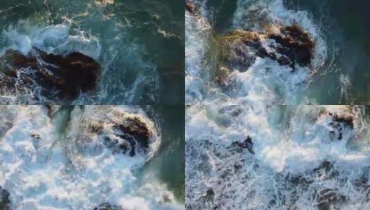 俯拍海浪拍打礁石、浪花、大海高清在线视频素材下载