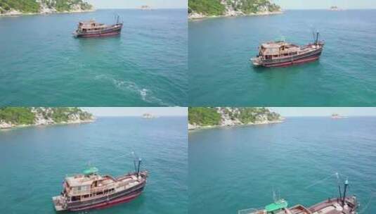 无人机飞越靠近海岸的潜水船。泰国涛岛高清在线视频素材下载