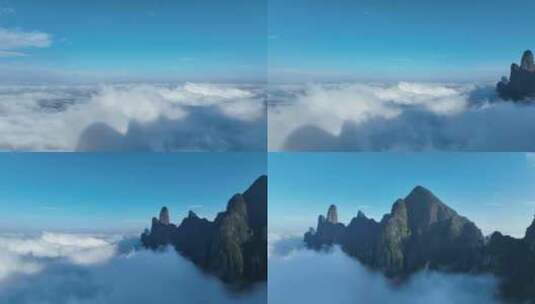 无人机航拍云层之上的云海仙境山峰圣堂山高清在线视频素材下载