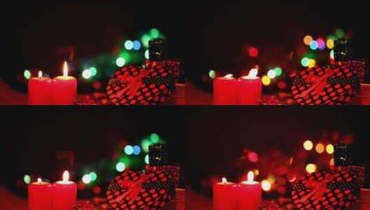 礼物和后面闪烁的蜡烛高清在线视频素材下载