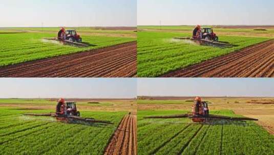 拖拉机在农田喷洒农药高清在线视频素材下载