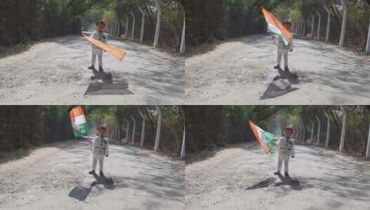 白天从平角挥舞印度三色国旗的小孩高清在线视频素材下载
