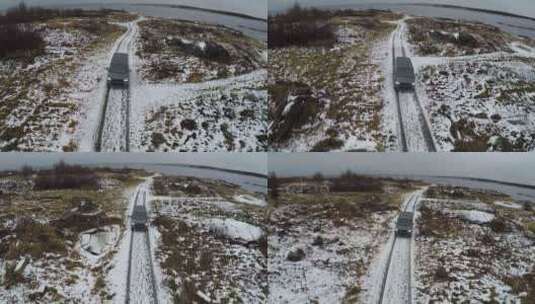 雪中行驶的汽车高清在线视频素材下载