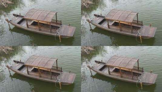 湖面渔船木船在水面飘浮停泊高清在线视频素材下载