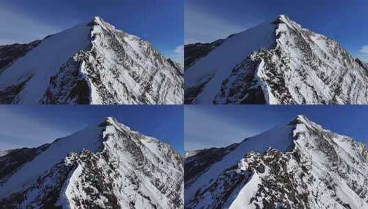 航拍四川岷山山脉雪宝顶雪山山脊上的登山队高清在线视频素材下载