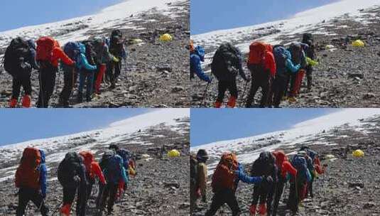 攀登新疆帕米尔高原慕士塔格峰雪山的登山队高清在线视频素材下载